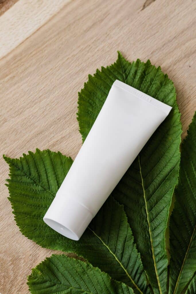 Shampoo bottle on a plant