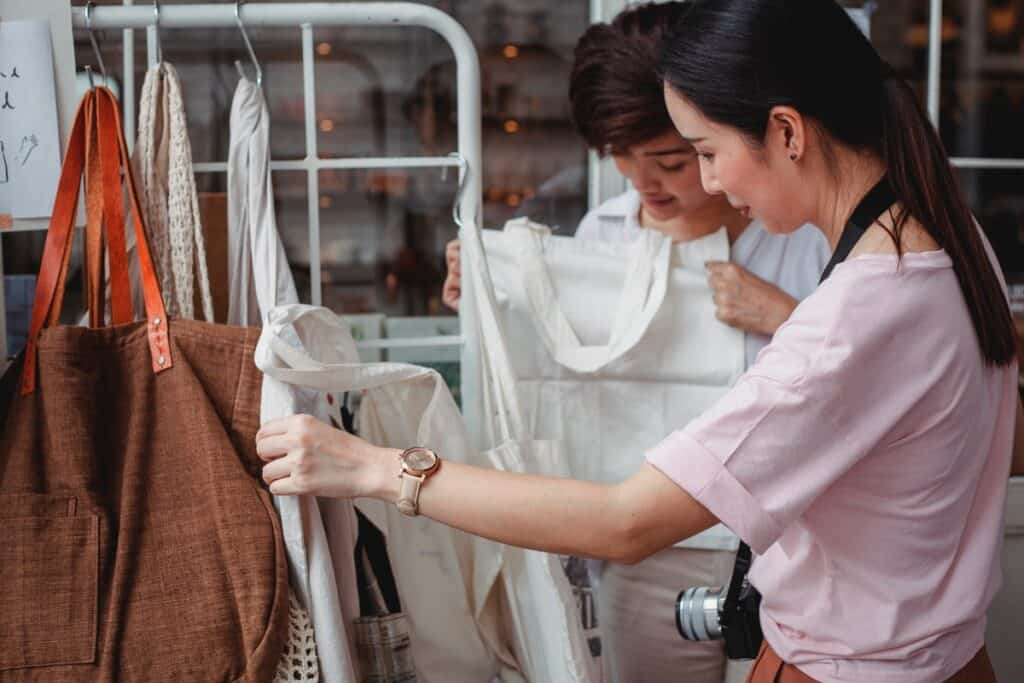 Two women looking at clothes